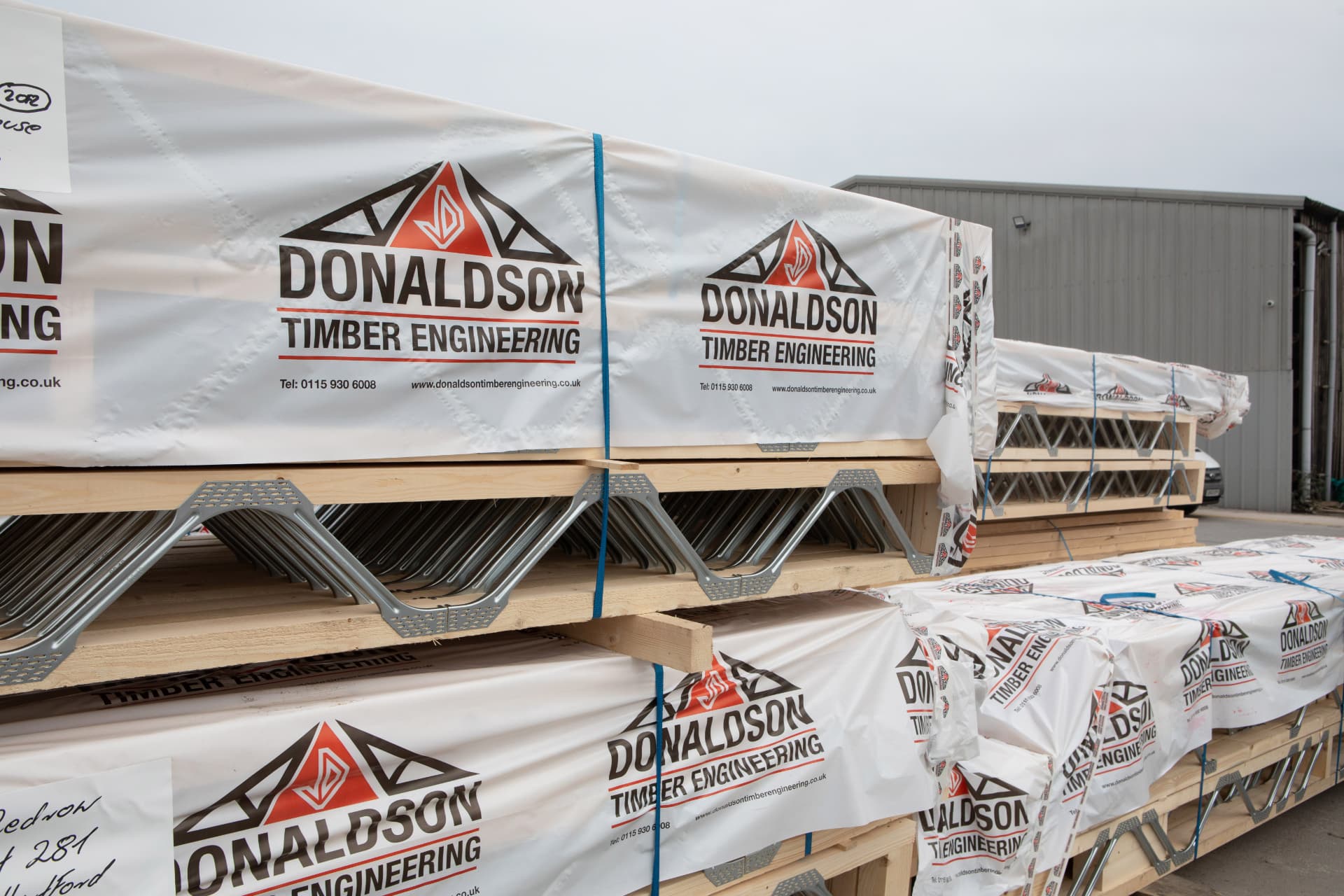 Donaldson Timber Engineering branded packs of Posi-Joists ready for delivery